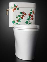 Specialty maple leaf painted toilet